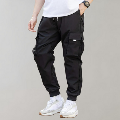 Ankor - Men's trousers with drawstring and flap pockets