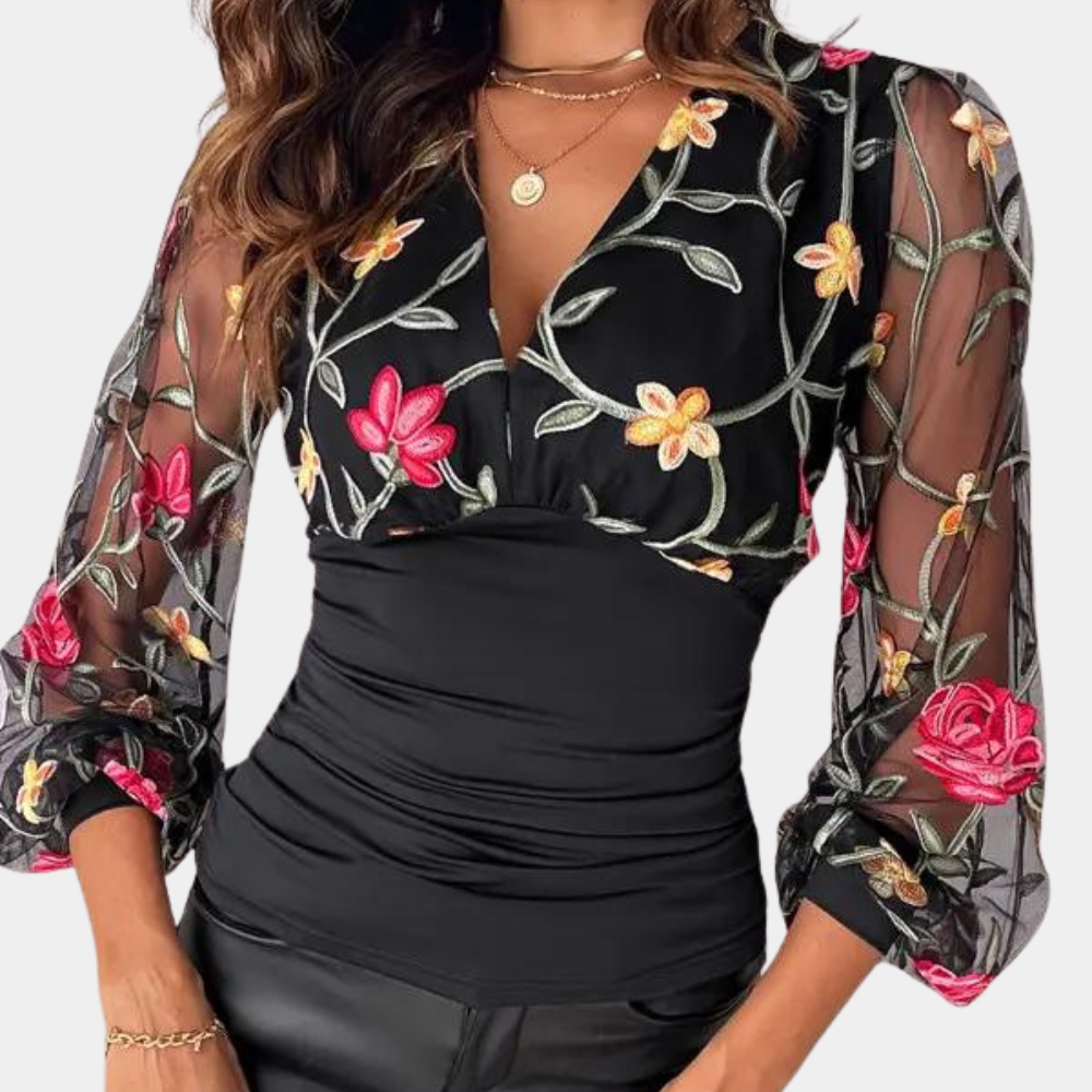 Elegant ladies top with floral embroidery