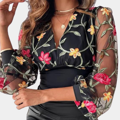 Elegant ladies top with floral embroidery